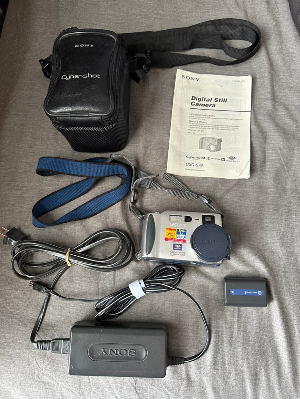 Sony Silver Point-and-Shoot Cyber-shot DSC-S70 Camera with Blue Neck Strap